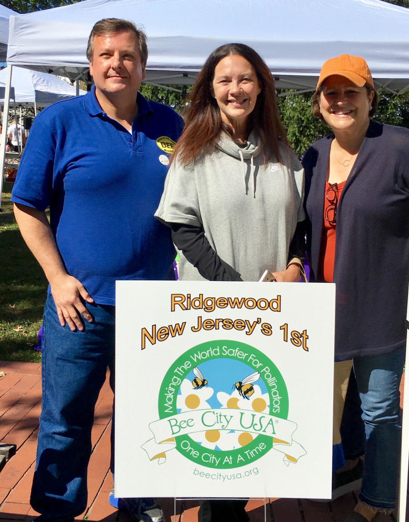 (In the photo, from left to right) Frank Mortimer, President, Northeast New Jersey Beekeepers Susan Knudsen, Mayor, Ridgewood Jennie Smith Wilson, Board of Education, Ridgewood 